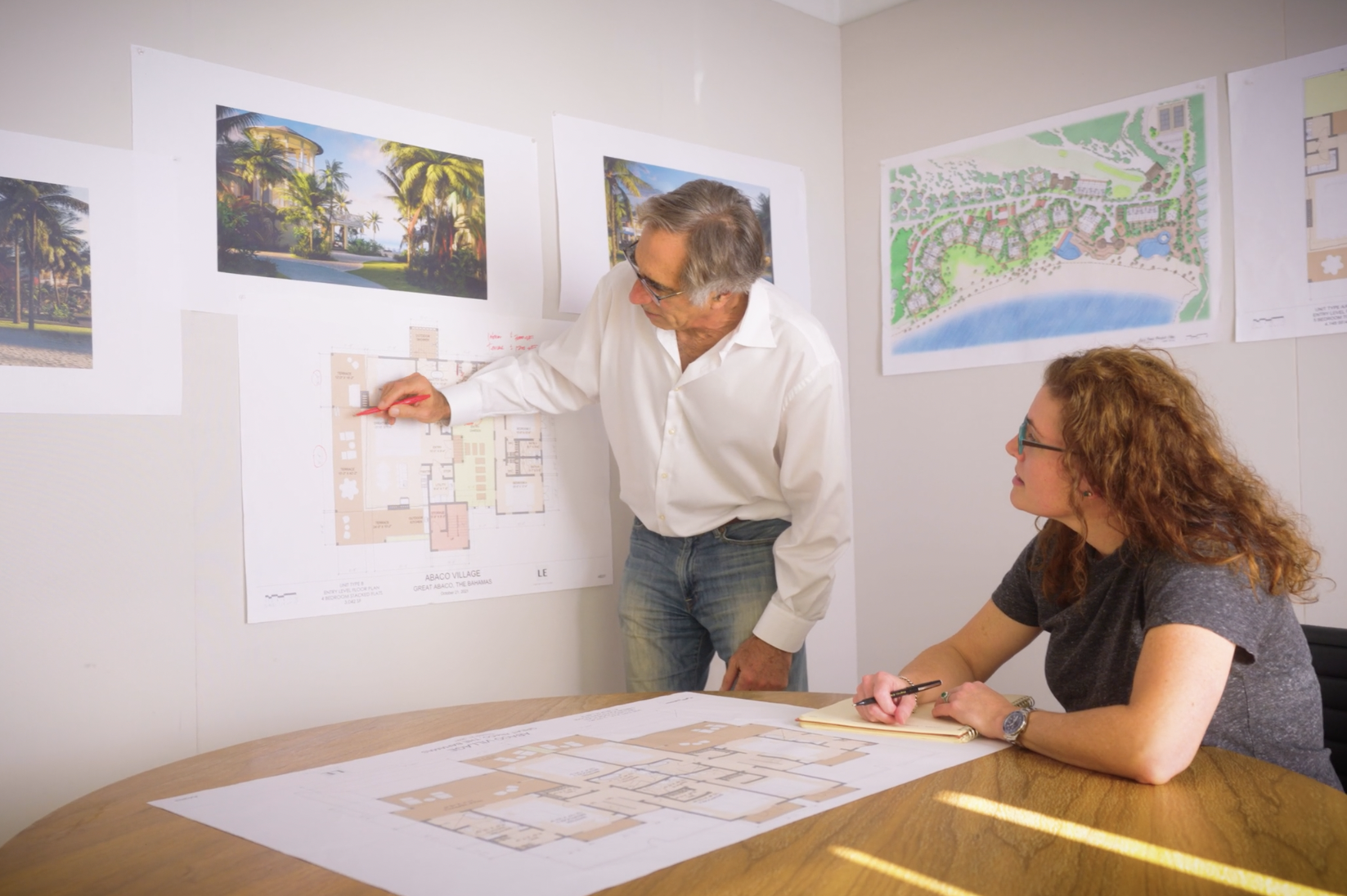 Don Vita and team reviewing floorplans
