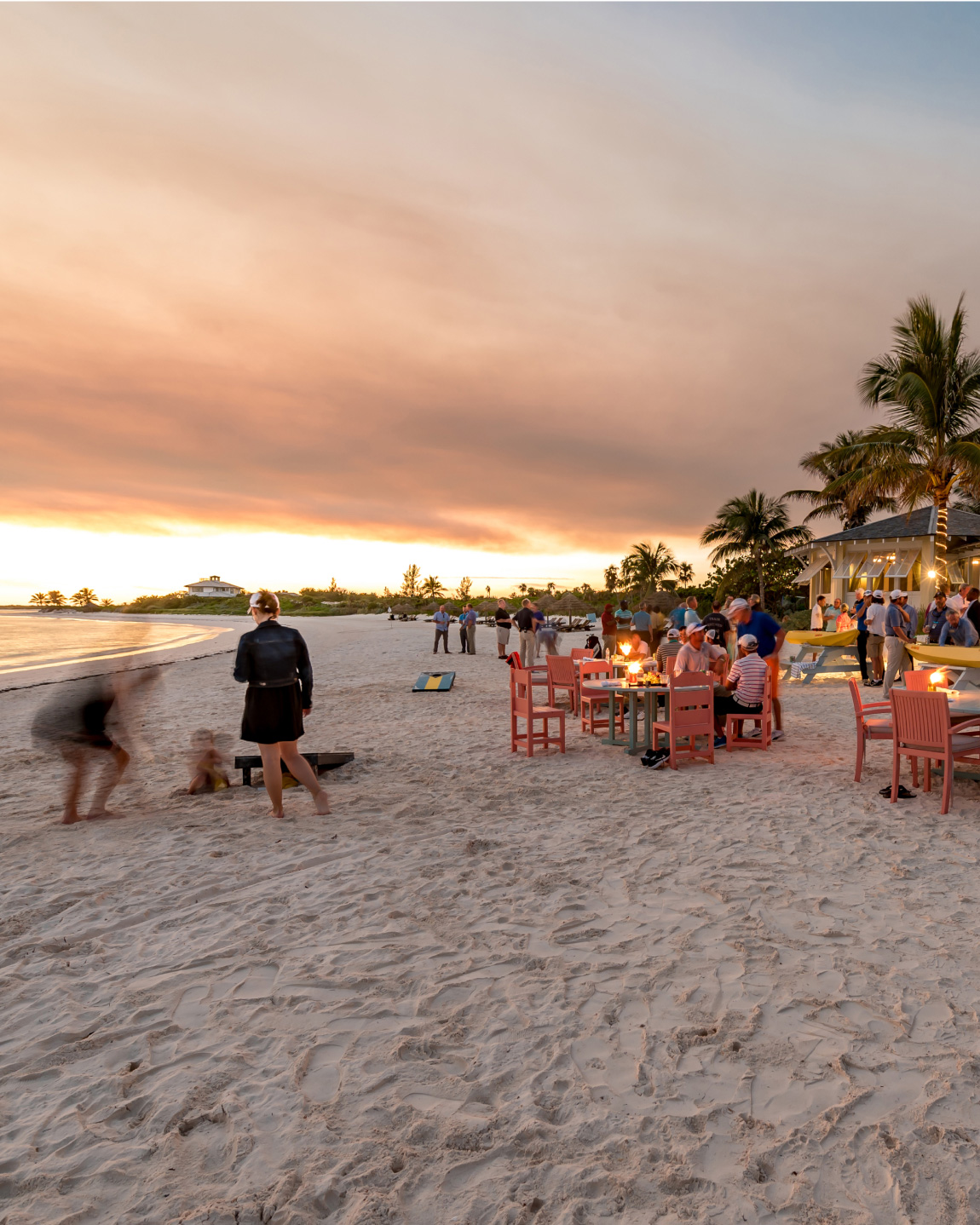 A group enjoys beachfront dining