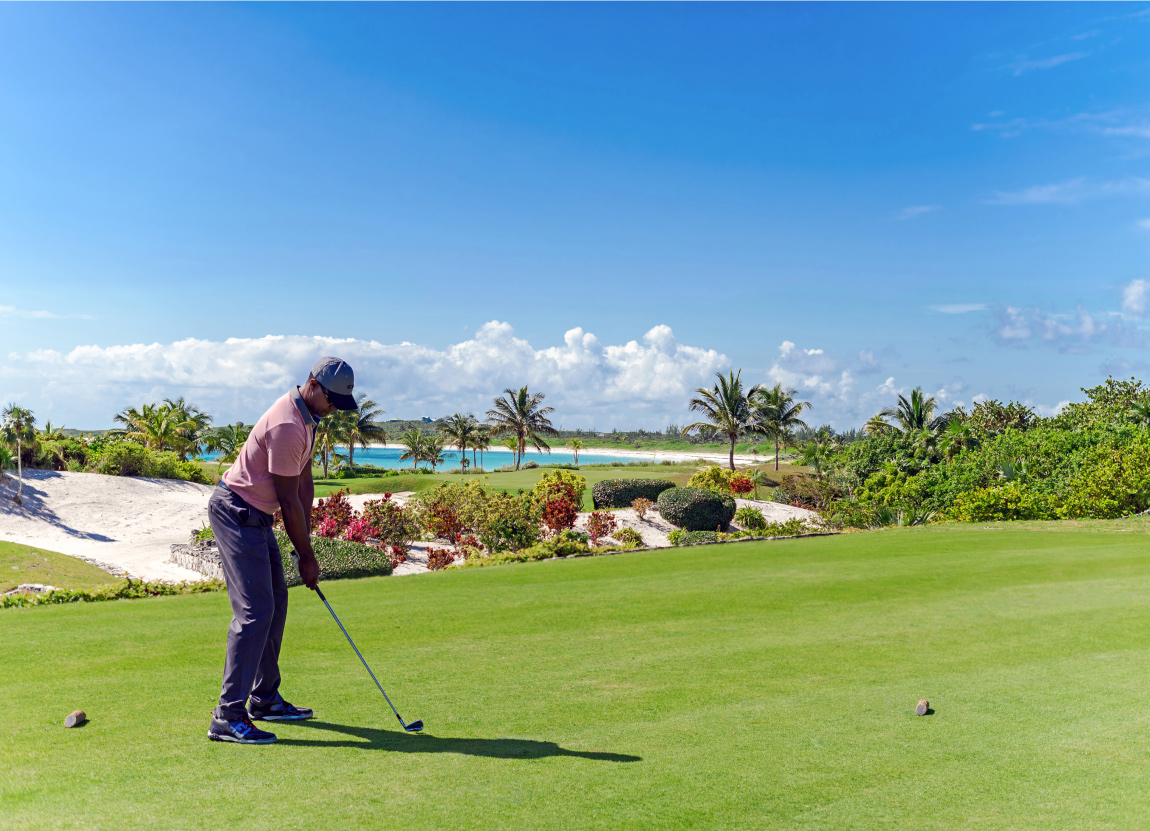 A golfer at The Abaco Club